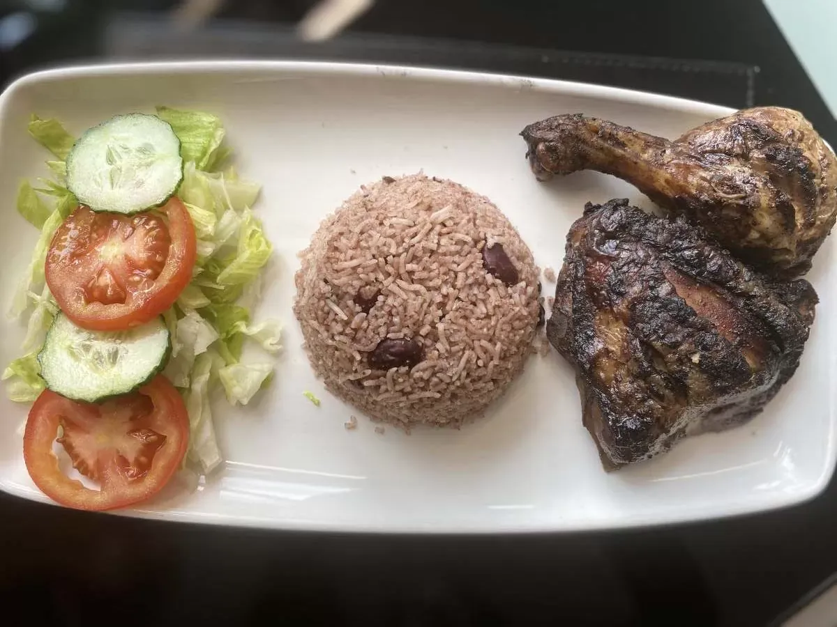 Jerk chicken with rice and peas and fresh salad Jemz Caribbean Café Bedford