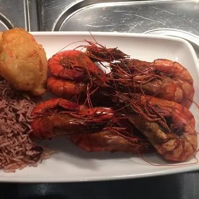 Plate of whole king prawns with rice and peas Jemz Caribbean Café Bedford